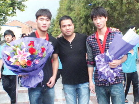 学生王波、王清秋荣获全运会拳击比赛第三名